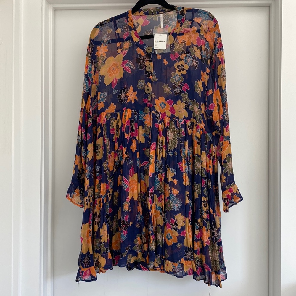 FREE PEOPLE printed knee length dress with matching slip. SIZE MEDIUM. NWT.